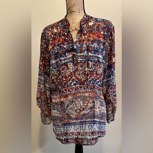 Chico’s.   Size 3. Sheer Multicolored top.